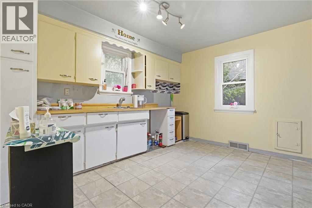 Kitchen featuring light countertops and open shelves - 549 Weber Street E, Kitchener, ON
