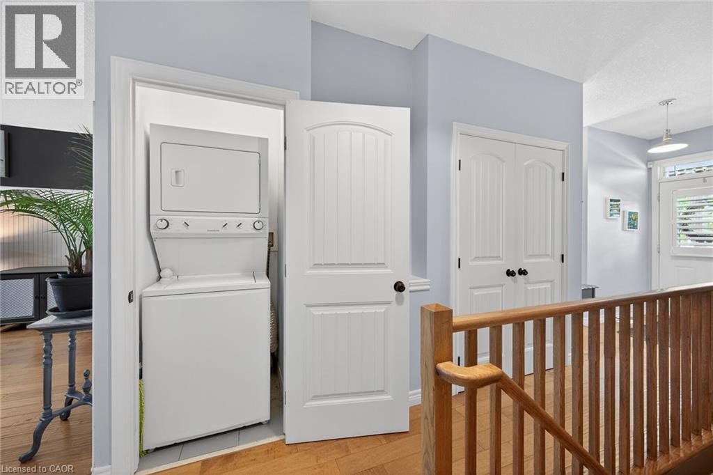 Convenient main floor laundry. - 6 Gaddye Lane, Binbrook, ON - Indoor Photo Showing Laundry Room