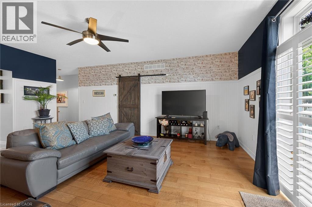 Generously sized living room offers loads of natural light. - 6 Gaddye Lane, Binbrook, ON - Indoor Photo Showing Living Room