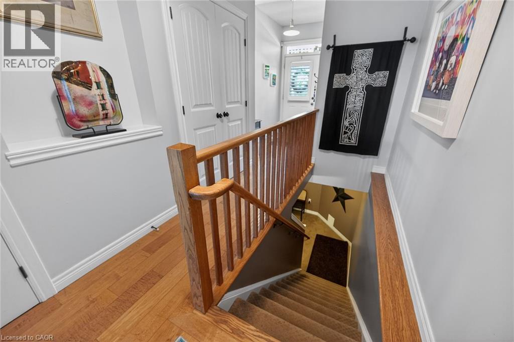 Staircase to professionally finished lower level. - 6 Gaddye Lane, Binbrook, ON - Indoor Photo Showing Other Room
