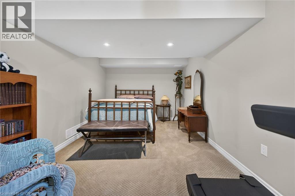 Second bedroom featured in lower level. Ideal for overnight visitors. - 6 Gaddye Lane, Binbrook, ON - Indoor Photo Showing Bedroom