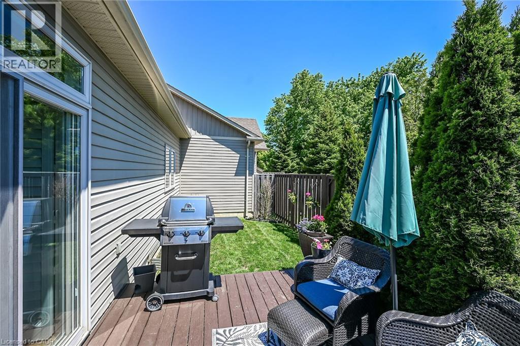 A little green space perfect for a furry family member! - 6 Gaddye Lane, Binbrook, ON - Outdoor With Deck Patio Veranda With Exterior
