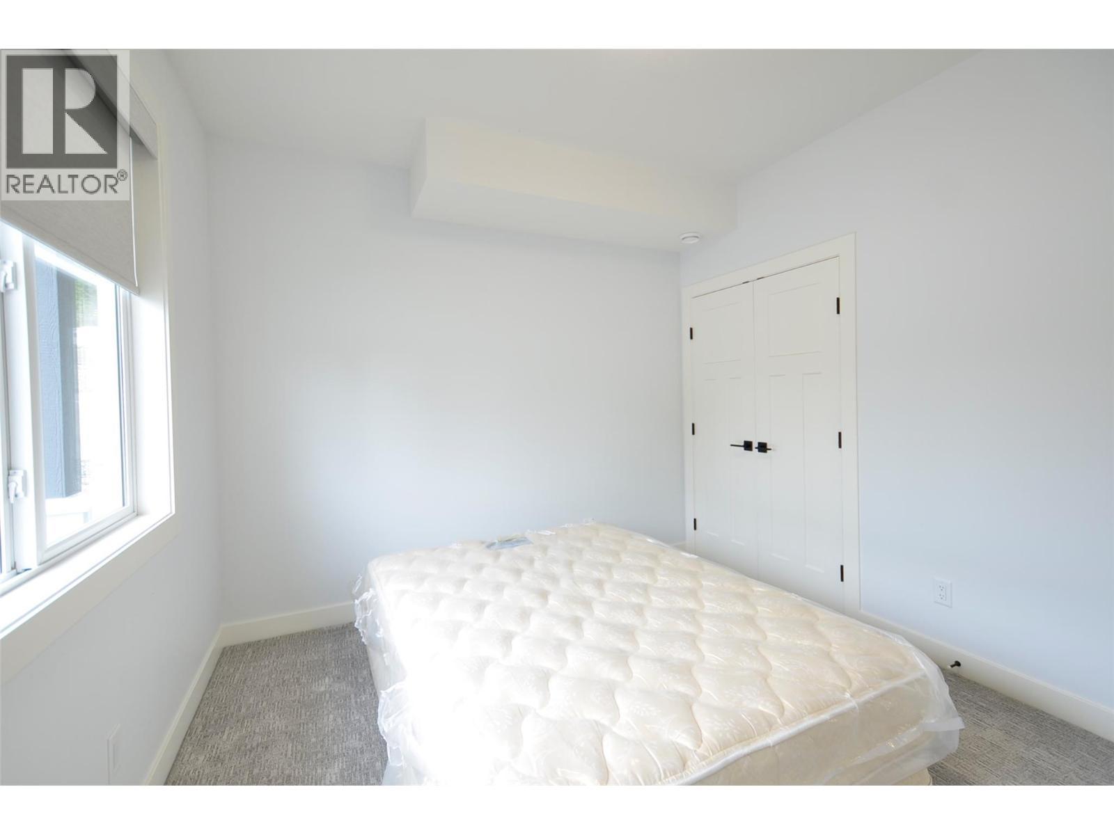 2744 Cedar Ridge Street, Lumby, BC - Indoor Photo Showing Bedroom