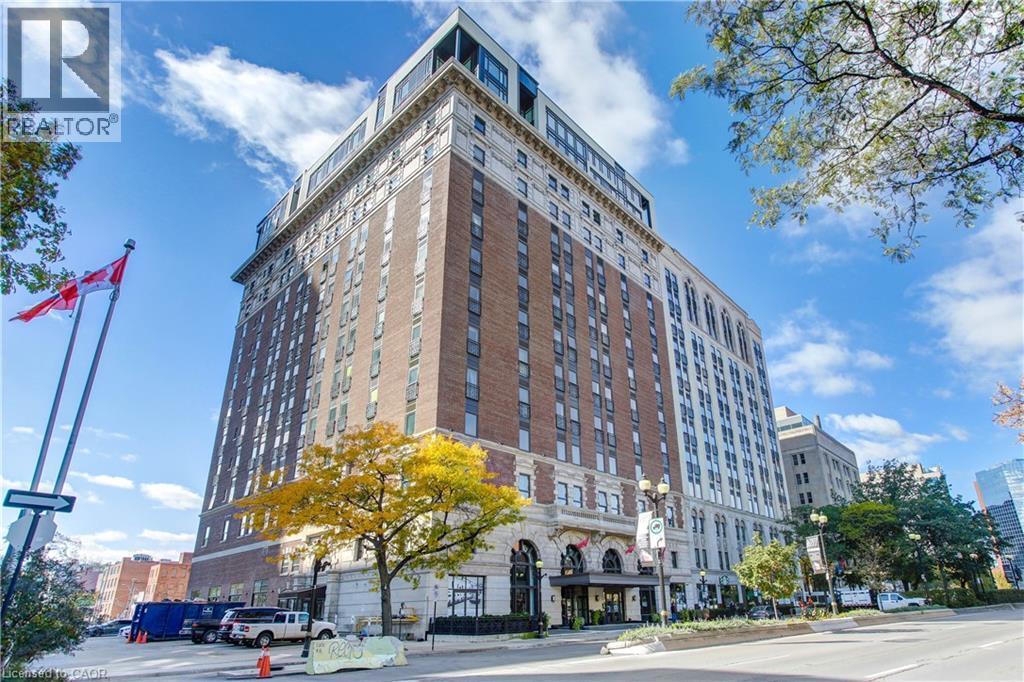 Historic multi-story building featuring a brick and stone facade - 112 King Street E Unit# Ph6, Hamilton, ON - Outdoor With Balcony With Facade