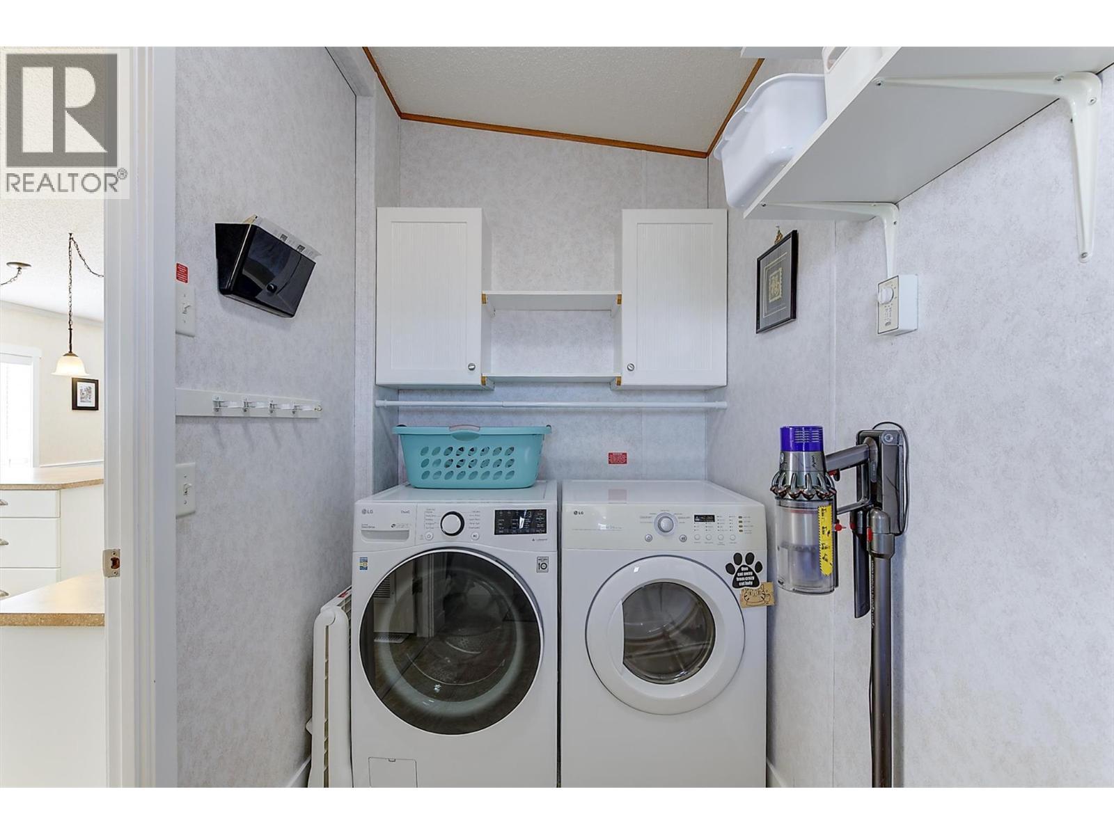 Laundry Room with Storage - 2440 Old Okanagan Highway Unit# 1304, West Kelowna, BC