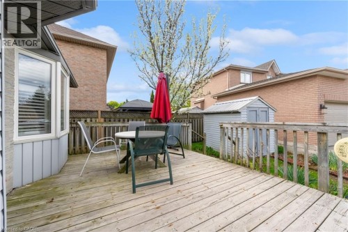 Expansive wood deck with a bay window, offering outdoor living space - 50 Spadara Drive, Hamilton, ON - Outdoor With Deck Patio Veranda With Exterior