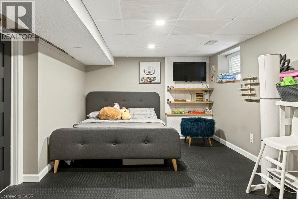 Finished interior space featuring recessed lighting, a drop ceiling, and neutral wall tones - 99 Hillcrest Avenue, Hamilton, ON - Indoor Photo Showing Bedroom