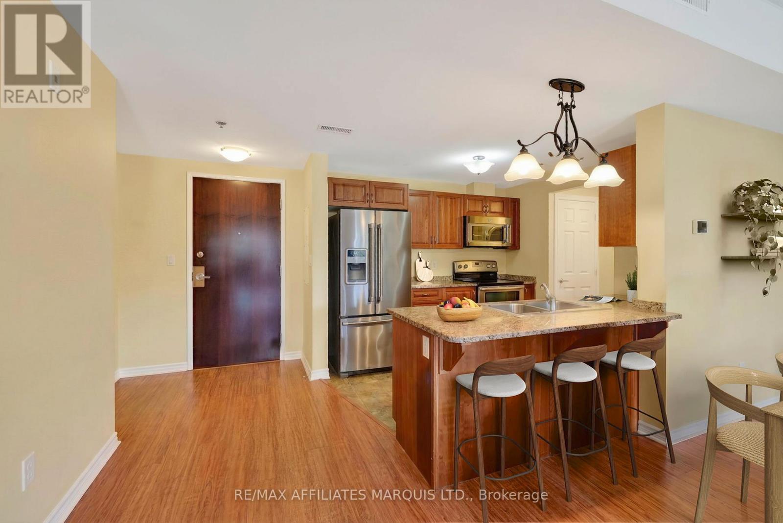 This image has been virtually staged. - 500 - 108 Second Street E, Cornwall, ON