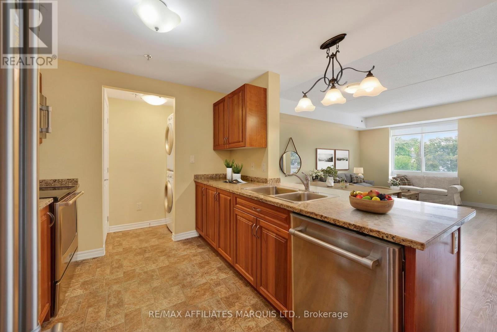 This image has been virtually staged. - 500 - 108 Second Street E, Cornwall, ON