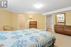 Basement Bedroom with walk in closet. -