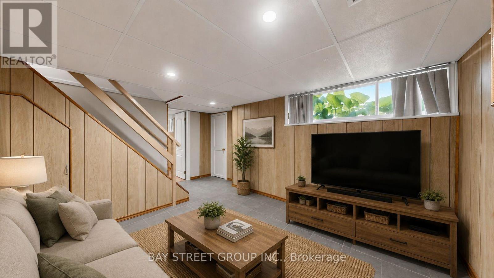 Basement Living Room - Ai Stage - 26 Innismore Crescent E, Toronto, ON