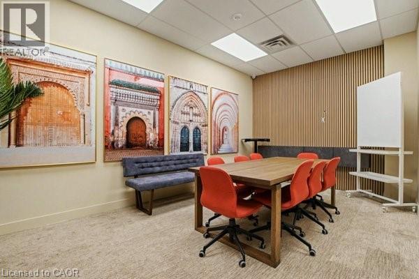 Office area featuring a drop ceiling - 580 Coldstream Drive Unit# 307, Waterloo, ON