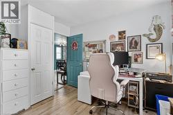 Light wood-finish flooring provides a neutral base for this versatile room -