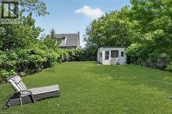 Expansive green lawn providing abundant outdoor space -