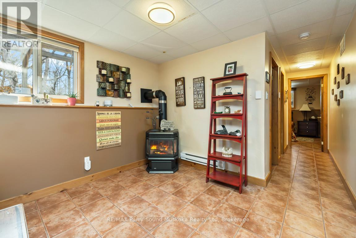 Gas fireplace on lower level - 5 Meharg Drive, Mckellar, ON