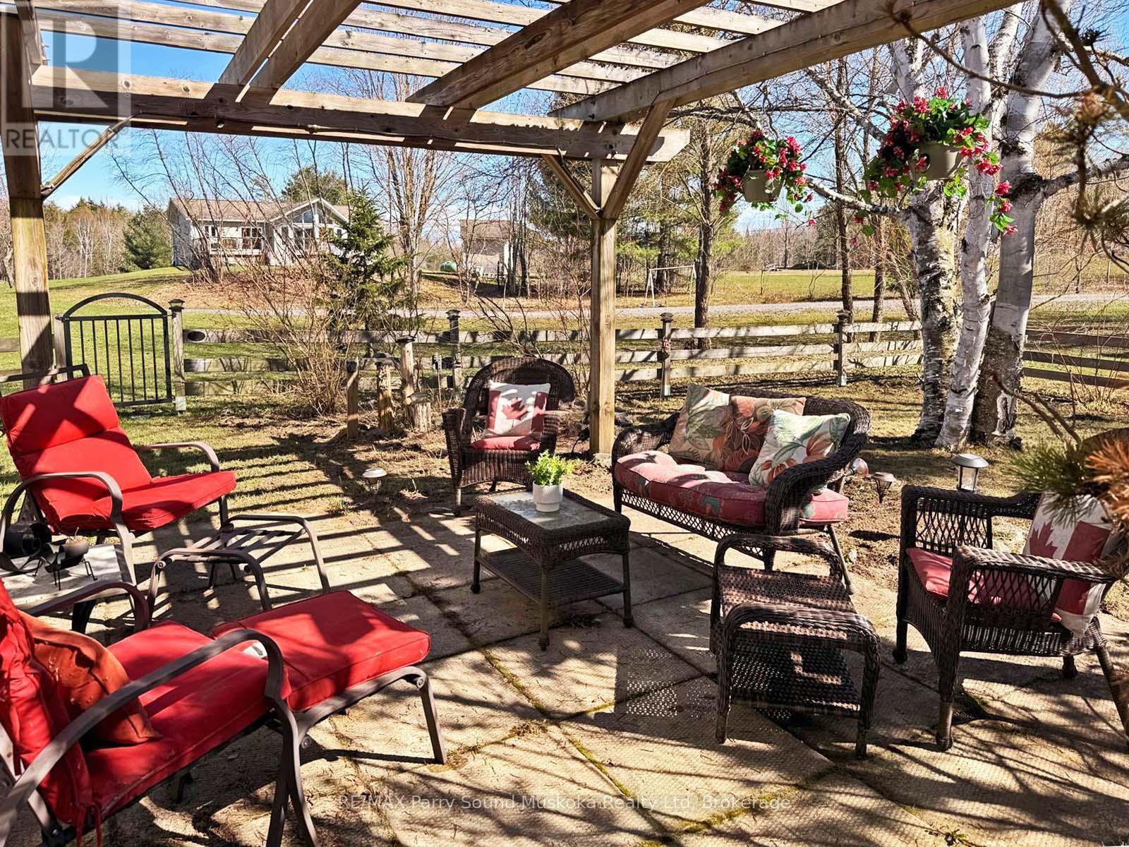 Relax in the covered patio - 5 Meharg Drive, Mckellar, ON