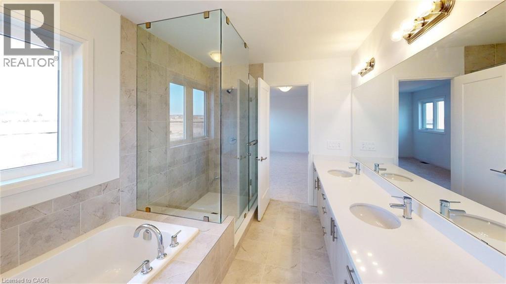 Contemporary bathroom featuring a spacious walk-in shower with glass enclosure, a built-in soaking tub, a dual vanity with undermount sinks, and large format tile flooring - 200 Cittadella Boulevard, Hamilton, ON