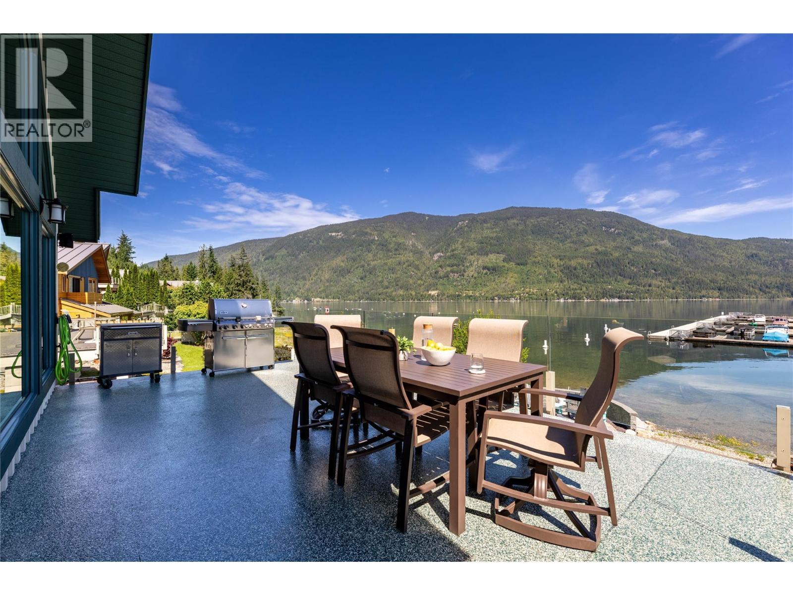outdoor entertaining made easy with a large deck new railings and apoxy deck in 2015 - 6421 Eagle Bay Road Unit# 13, Eagle Bay, BC