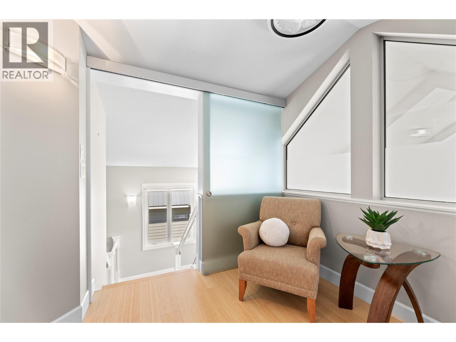 seating area in the primary bedroom - 6421 Eagle Bay Road Unit# 13, Eagle Bay, BC