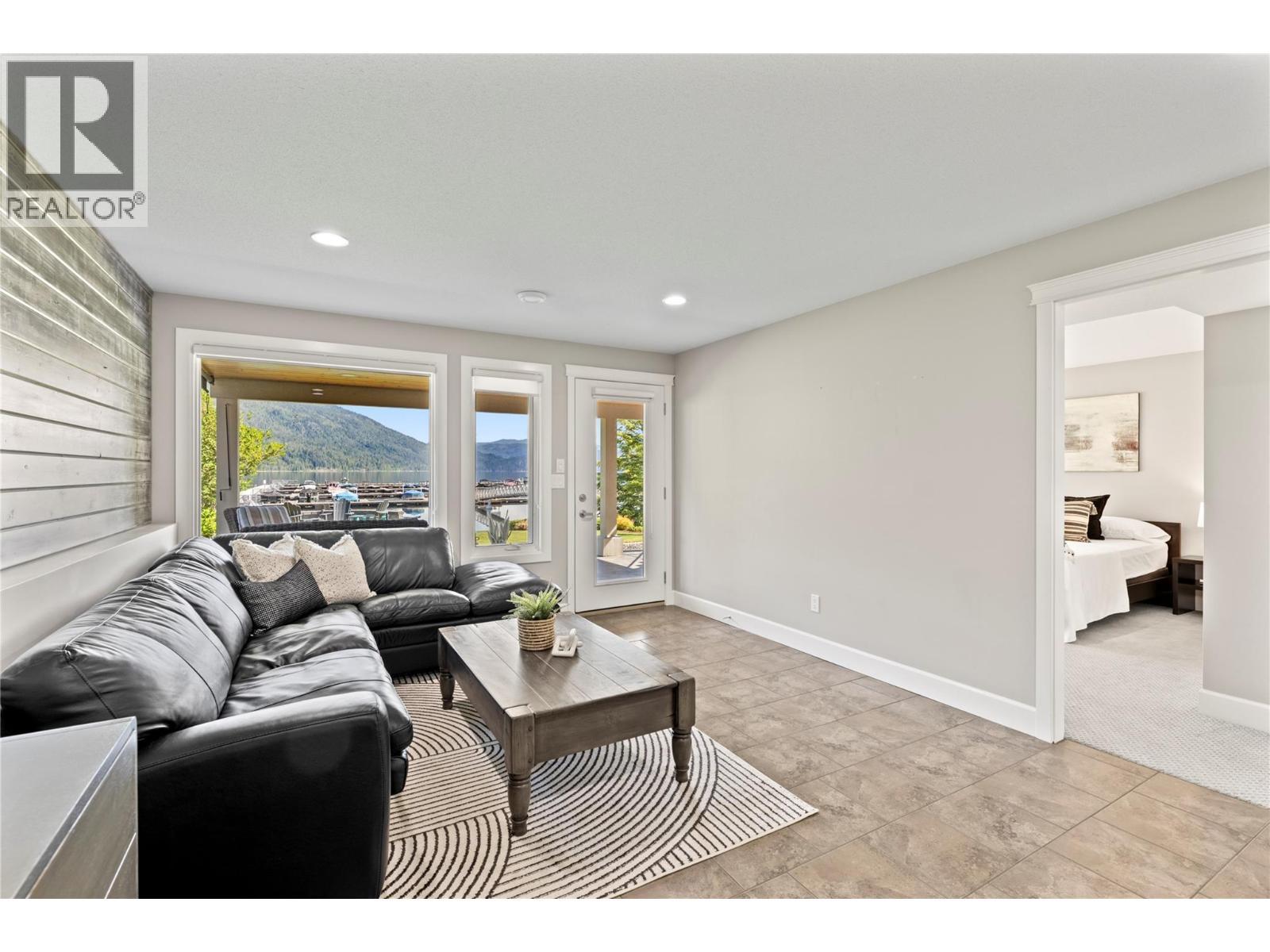 downstairs family room is great place to unwind after a day of sun - 6421 Eagle Bay Road Unit# 13, Eagle Bay, BC