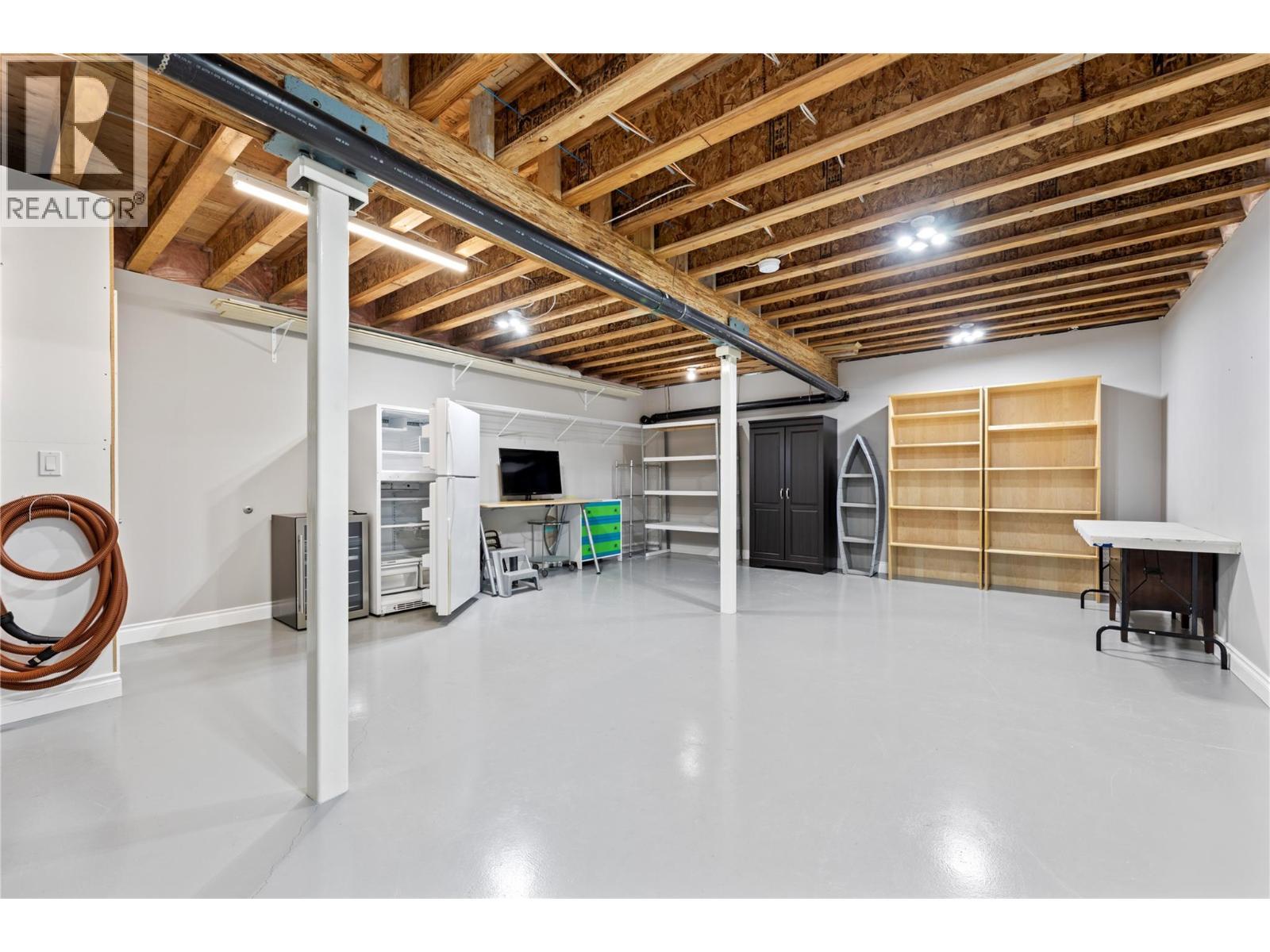 no shortage of space to store your stuff and toys or maybe make a games room - 6421 Eagle Bay Road Unit# 13, Eagle Bay, BC