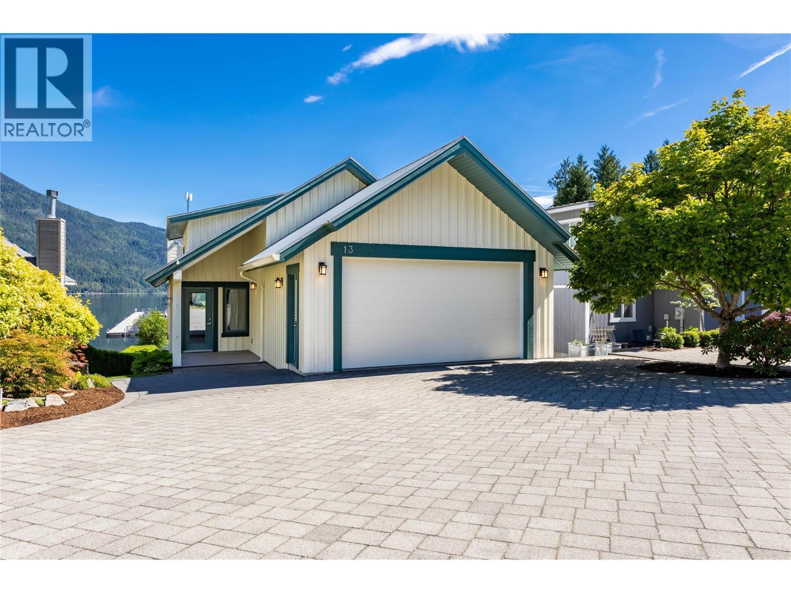 beautiful pavers in the large flat driveway make for lots of parking and easy access - 6421 Eagle Bay Road Unit# 13, Eagle Bay, BC