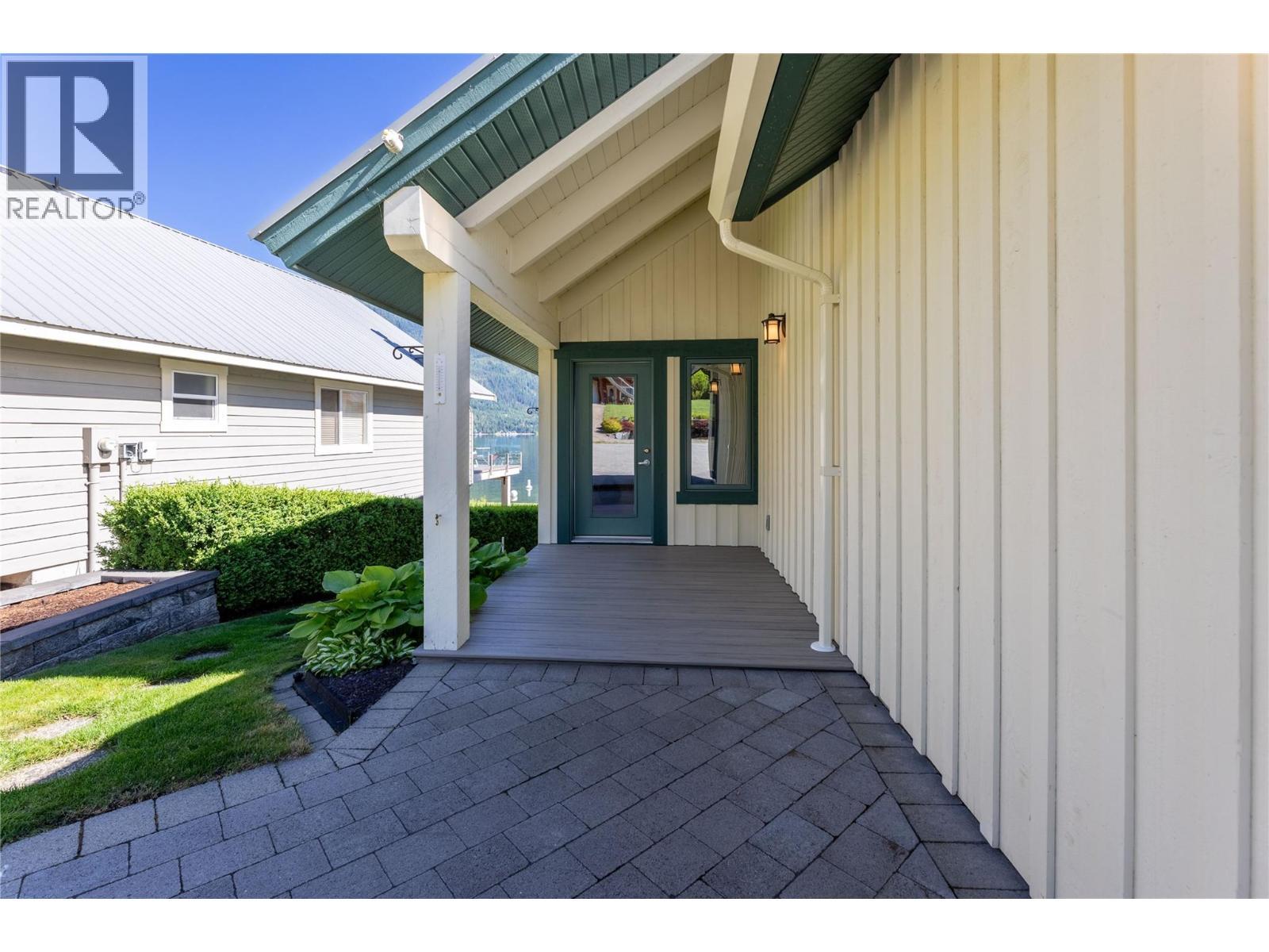 partially covered main entrance with nice wide easy access walkway - 6421 Eagle Bay Road Unit# 13, Eagle Bay, BC