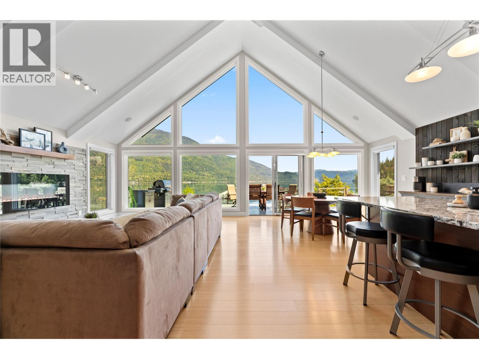 Windows all the way to the peak allows for the best views and truly allows to you feel on the water - 6421 Eagle Bay Road Unit# 13, Eagle Bay, BC