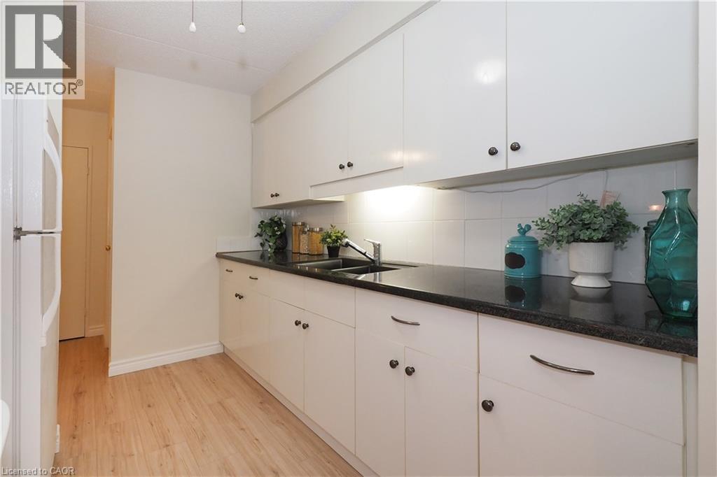 40 Tannery Street E Unit# 265, Cambridge, ON - Indoor Photo Showing Kitchen With Double Sink