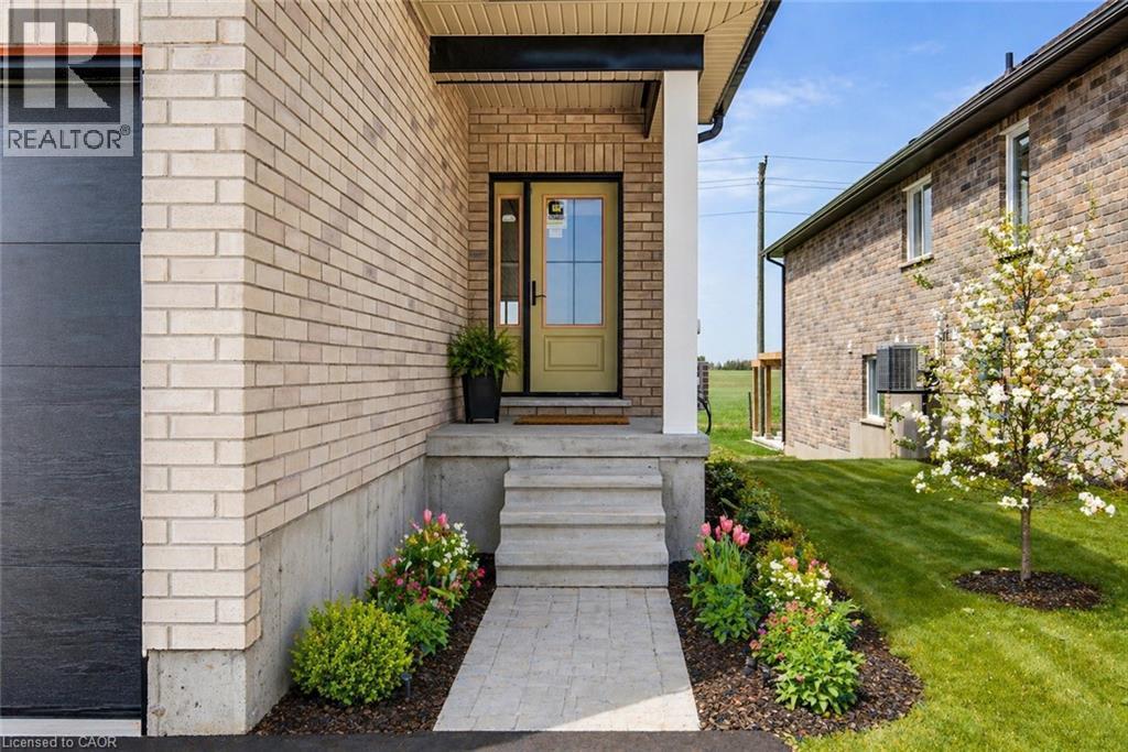 AI FINISHED ENTRANCE - 114 Bedell Drive, Mapleton, ON - Outdoor With Exterior