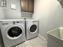 Laundry Room with full size Washer/Dryer & Sink - 