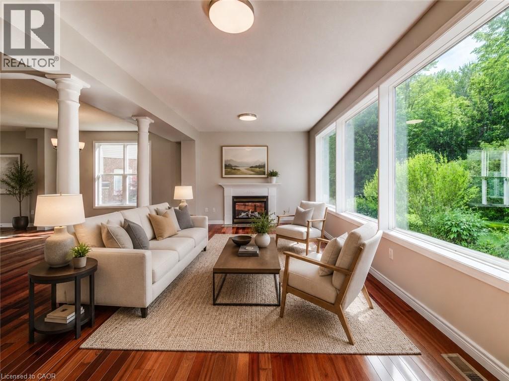 Virtually staged living room. - 712 Brookmill Place, Waterloo, ON