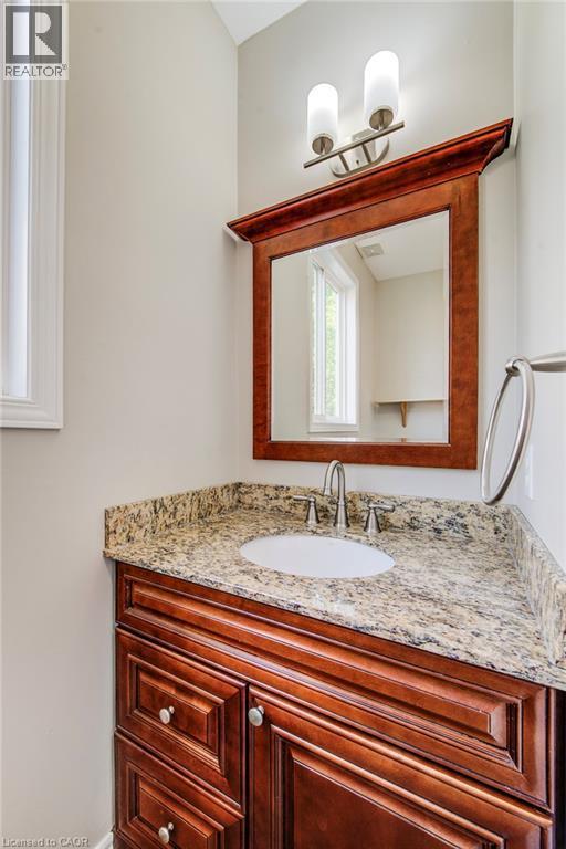 Main floor powder room. - 712 Brookmill Place, Waterloo, ON
