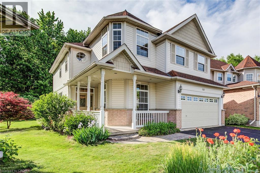 Welcoming, covered entry. - 712 Brookmill Place, Waterloo, ON