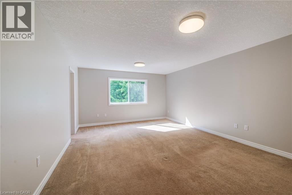 Primary bedroom. - 712 Brookmill Place, Waterloo, ON