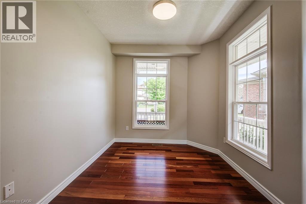 Brazilian cherry hardwood is amazing. - 712 Brookmill Place, Waterloo, ON