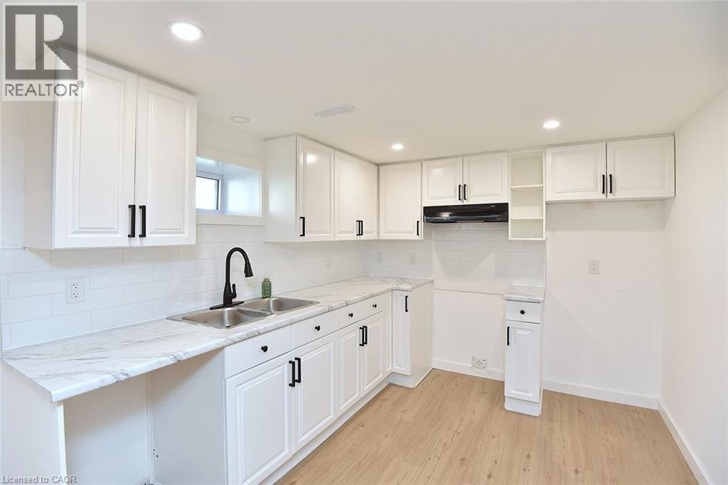 19 Gildea Street, Hamilton, ON - Indoor Photo Showing Kitchen With Double Sink