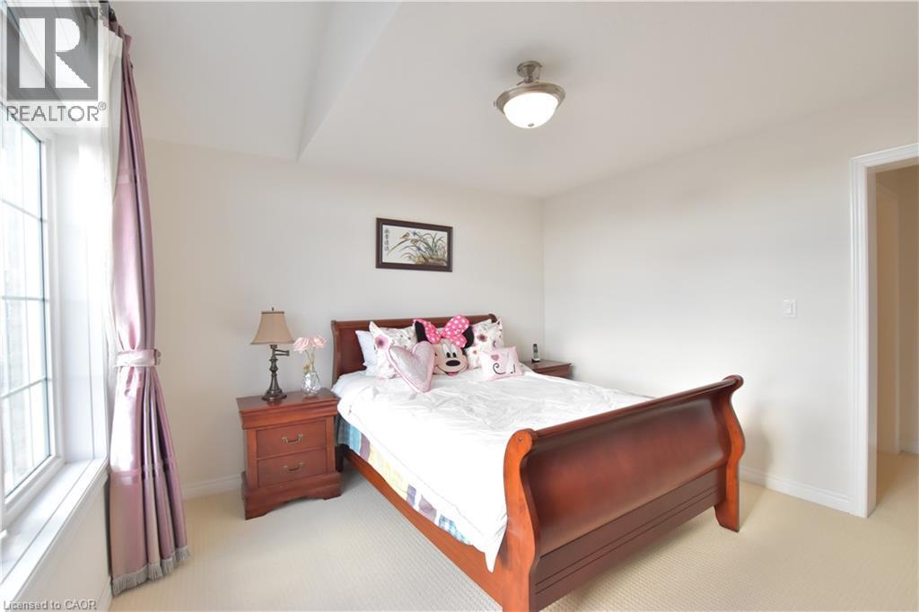 Bedroom featuring light colored carpet - 512 Terrington Crescent, Kitchener, ON