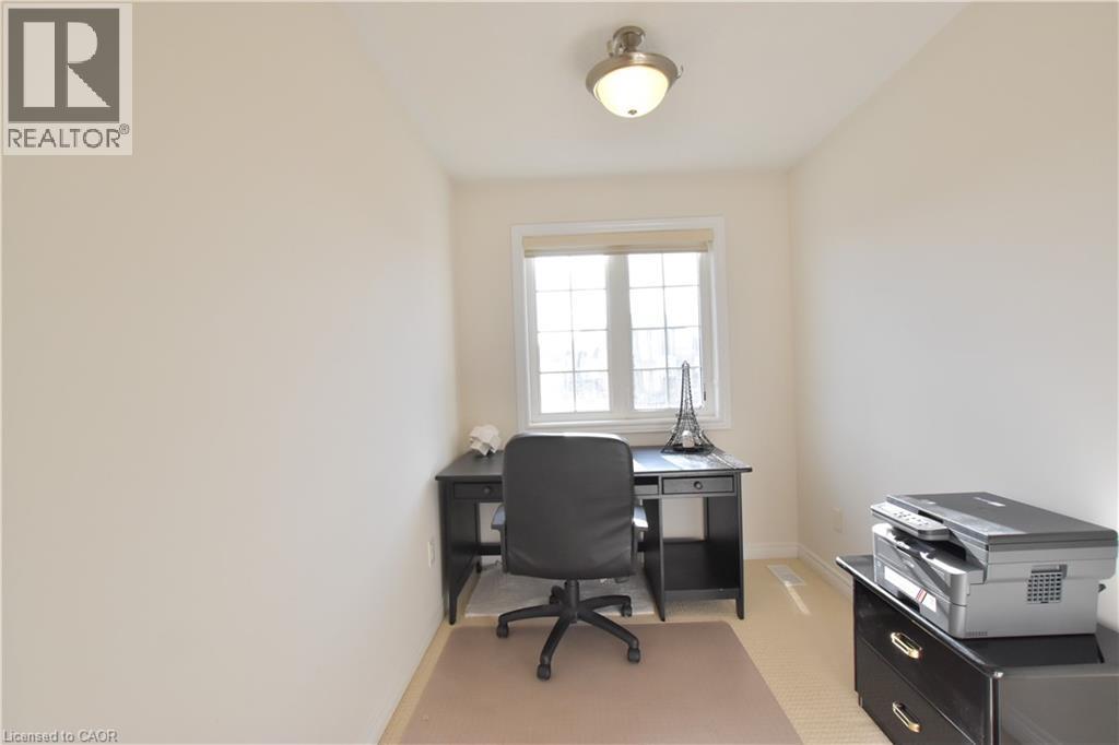 Office space featuring baseboards and light colored carpet - 512 Terrington Crescent, Kitchener, ON