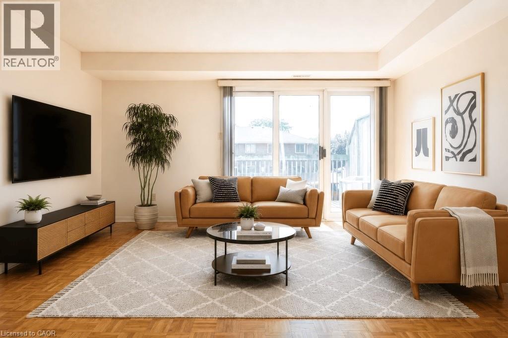 virtually staged - 266 Limeridge Road E Unit# 10, Hamilton, ON - Indoor Photo Showing Living Room