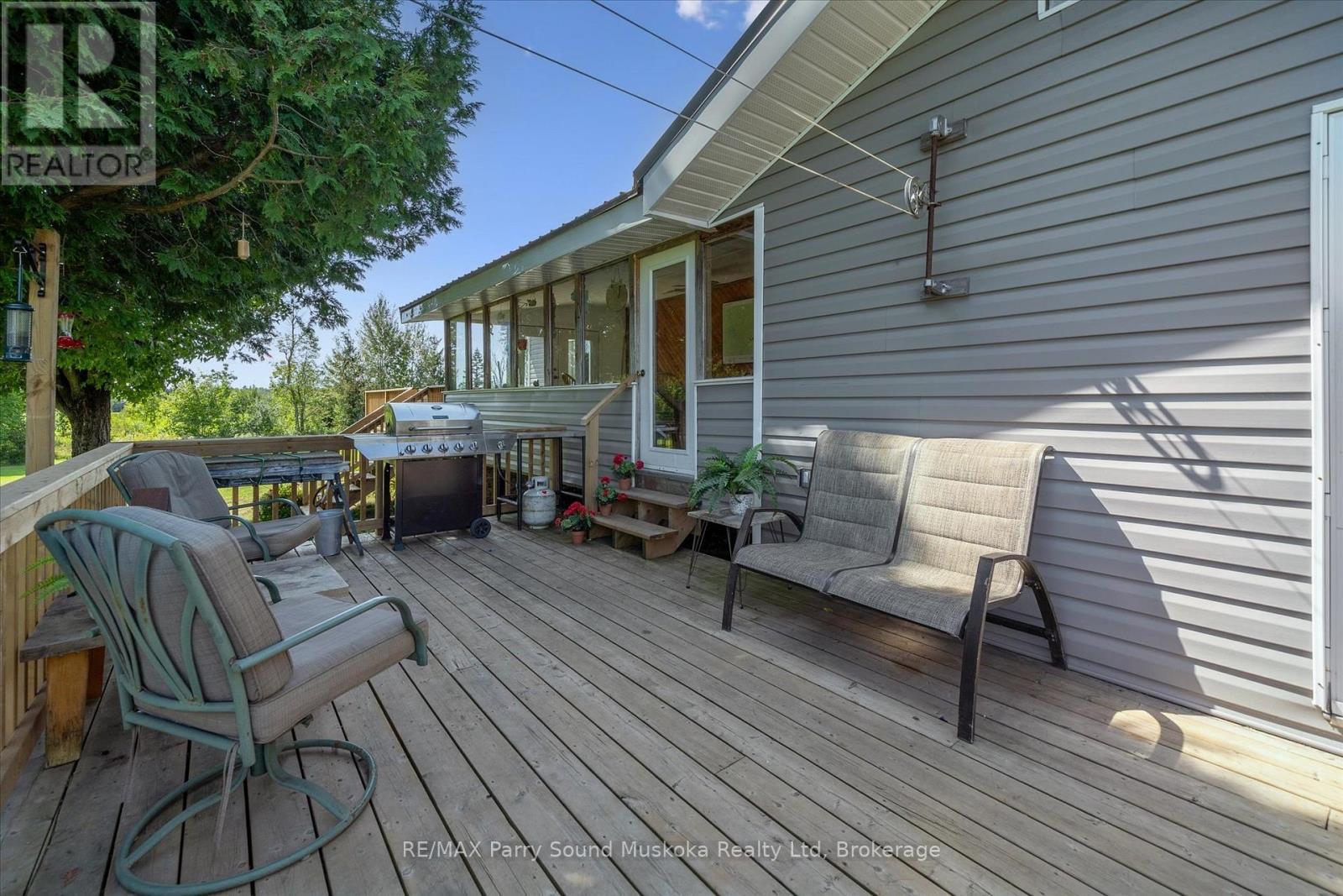 Walk out to private deck - 39 Hardies Road, Mckellar, ON