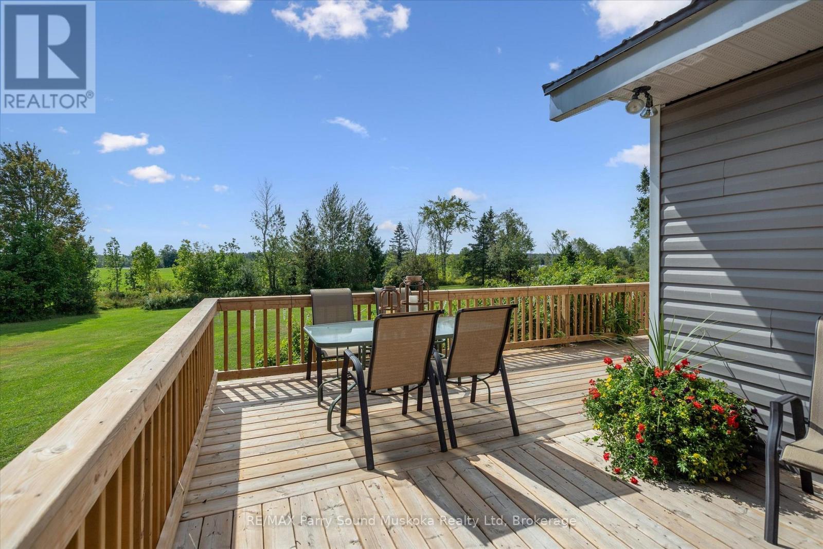 Wrap around decking - 39 Hardies Road, Mckellar, ON