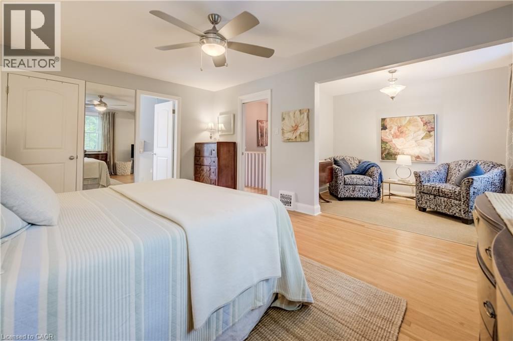 Hardwood-style flooring extends into a separate sitting area - 314 Glasgow Street, Kitchener, ON