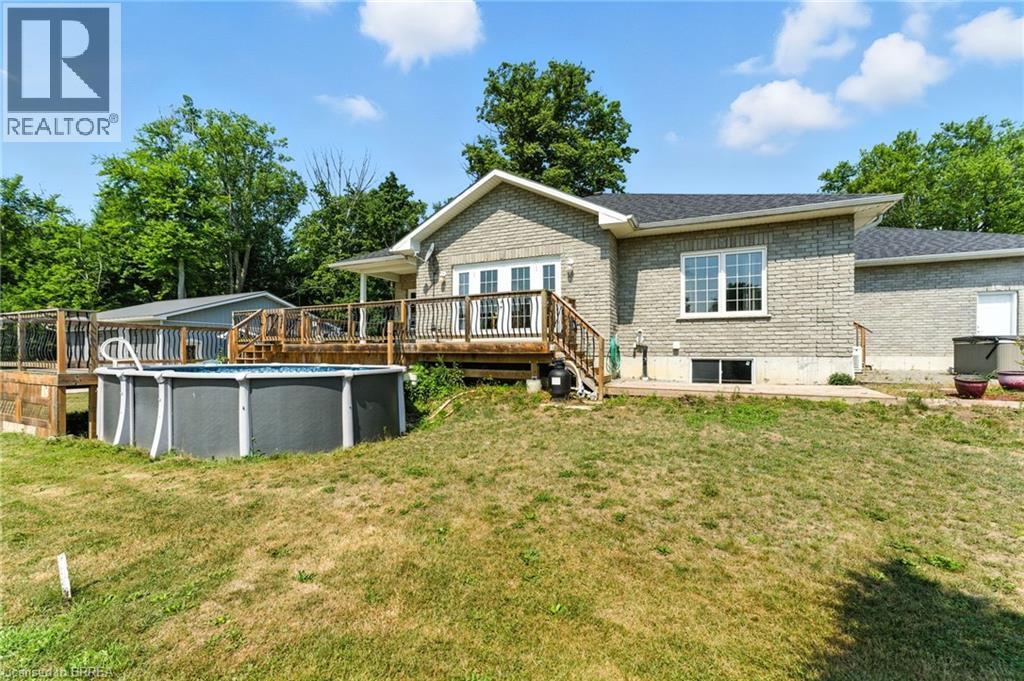 1026 Front Road, St. Williams, ON - Outdoor With Above Ground Pool With Deck Patio Veranda
