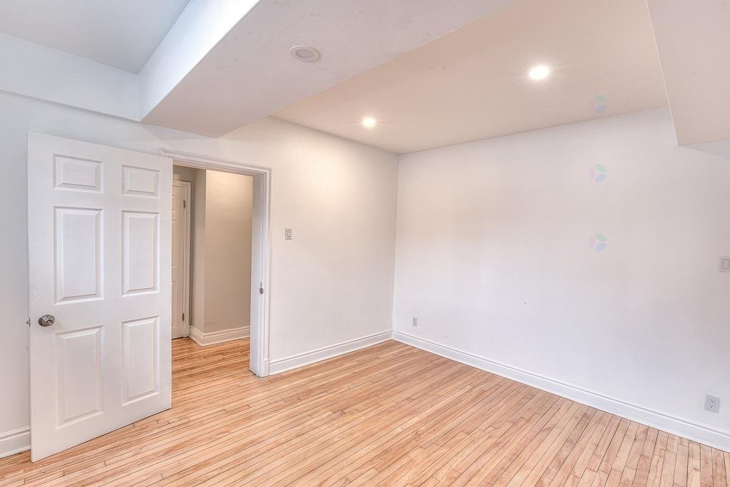 Living Room - 5892A Rue Dolbeau, Montréal (Côte-Des-Neiges/Notre-Dame-De-Grâce), QC - Indoor Photo Showing Other Room