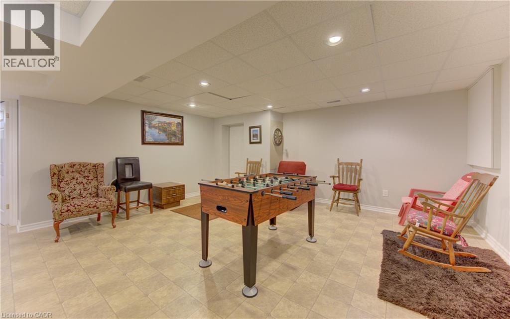 Finished basement space featuring recessed lighting and a drop ceiling - 599 Coldstream Drive, Waterloo, ON