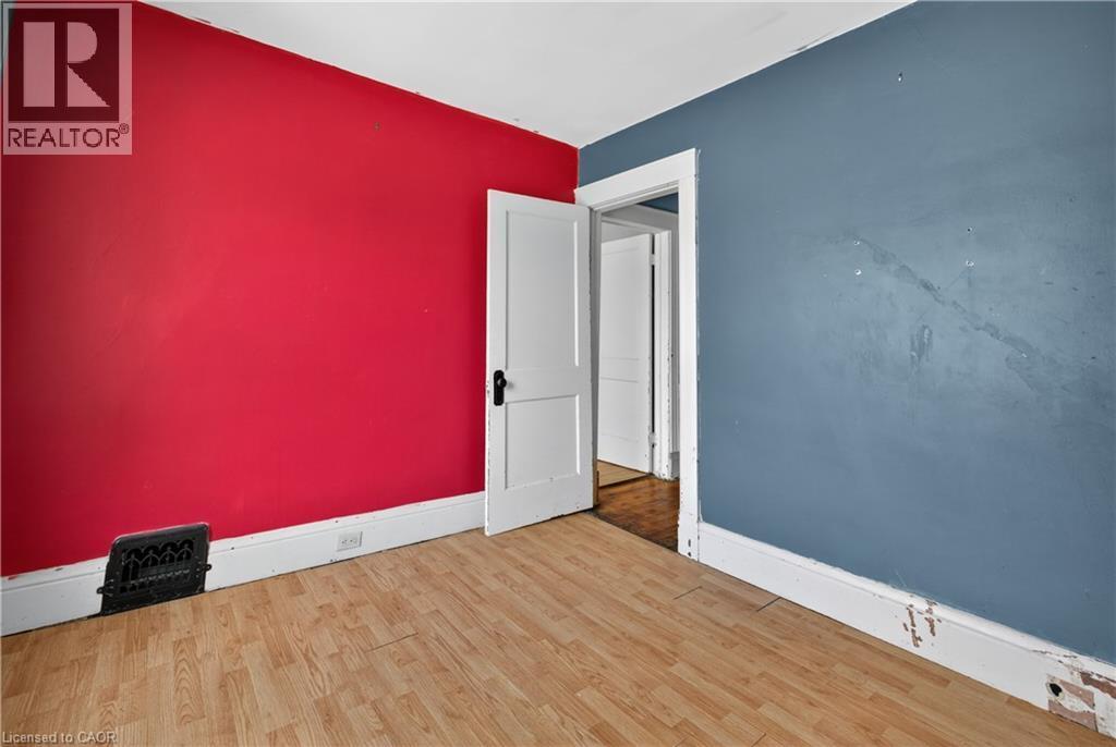 Wood-finish flooring throughout - 26 Arthur Avenue, St. Thomas, ON - Indoor Photo Showing Other Room