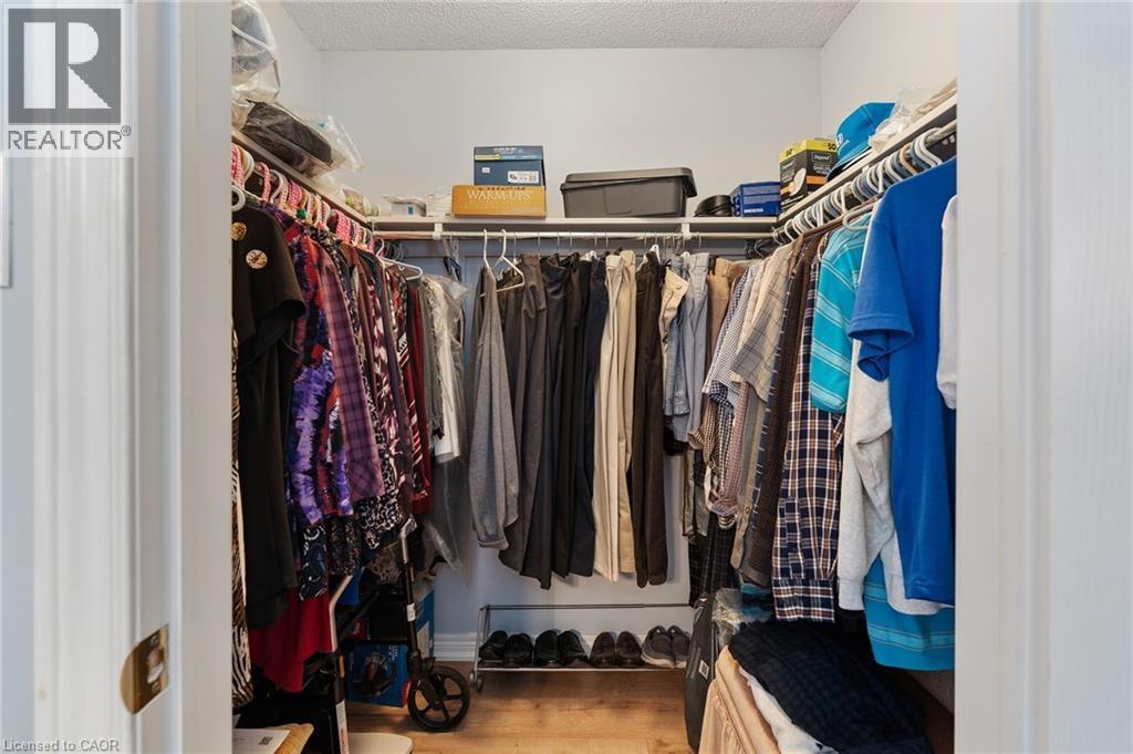 Primary Bedroom Walk-In Closet - 51 Redtail Crescent, Hamilton, ON