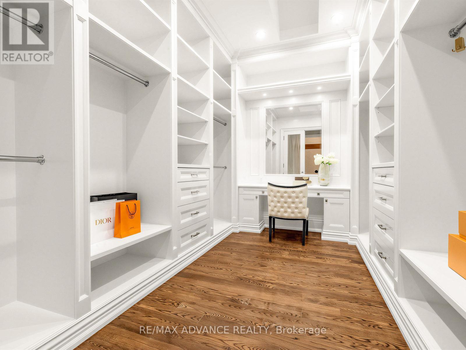 Exquisite primary bedroom closet - 5 Lloydminster Crescent, Toronto, ON