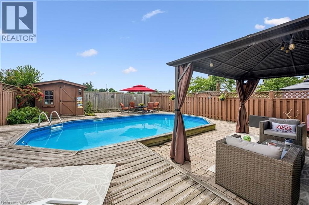 Pool - 817 Acadia Drive, Hamilton, ON - Outdoor With Above Ground Pool With Deck Patio Veranda With Backyard